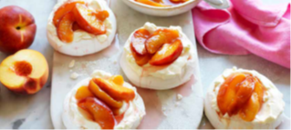 Poached peaches with pavlova