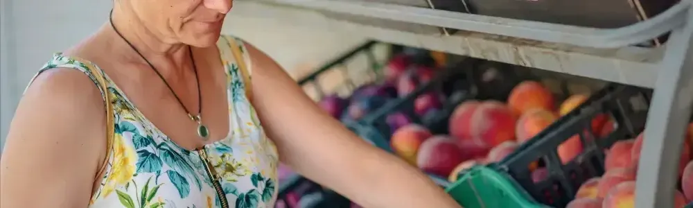 mature-woman-choosing-fruit-in-street-store-2026-01-08-23-22-09-utc-rn5zg3bl4n9lyfnjmx3c6ja201z3ivahzaso5xd67s (1)